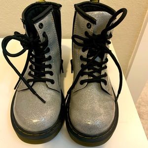 Used Dr. Martens combat boots.